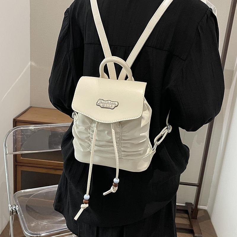 Niche design contrasting color backpack women's new pleated cute handbag versatile casual small backpack