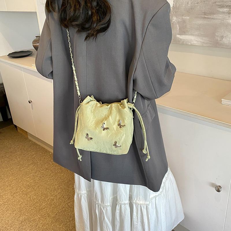 Fashion casual chain messenger bag summer simple pumping strap personalized butterfly shoulder bag new bucket women's bag