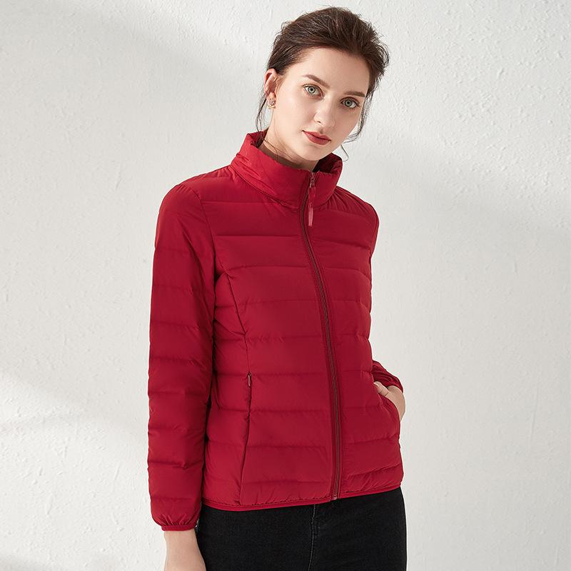 Down jacket women's light and seamless glue pressing autumn and winter new stand-up collar short cold-proof slim-fitting white duck down jacket