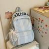 Schoolbag new vertical striped schoolbag female student Korean ins fashion plaid backpack large capacity lightweight casual backpack