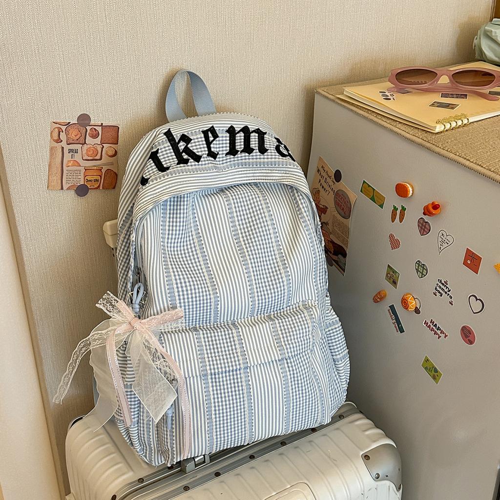 Schoolbag new vertical striped schoolbag female student Korean ins fashion plaid backpack large capacity lightweight casual backpack