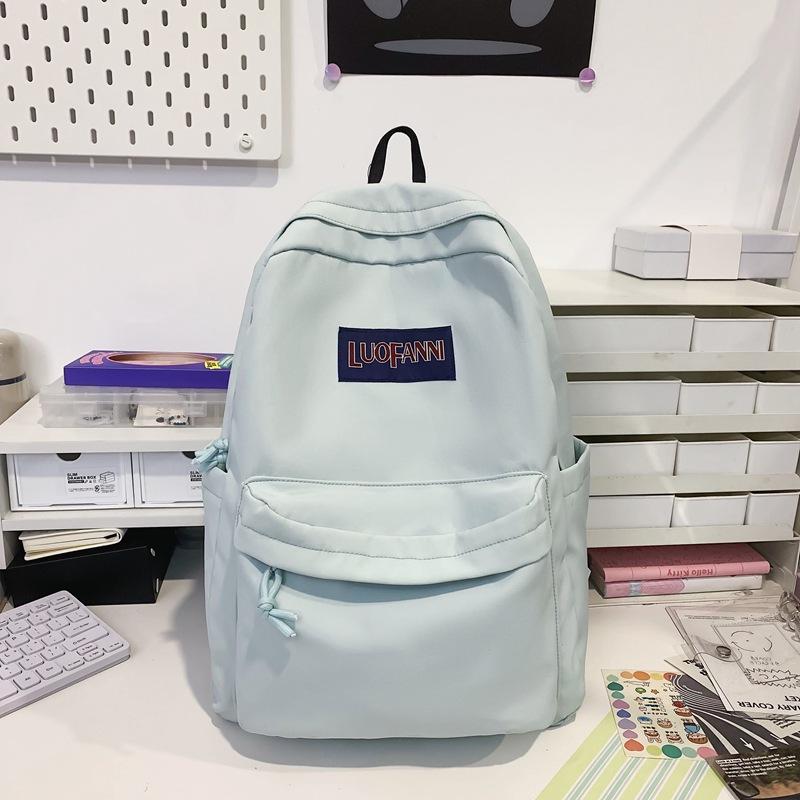 

Рюкзак новый популярный однотонный простой большой вместимости студенческая сумка для средней школы, сумка для ученика начальной школы single package светло-синий