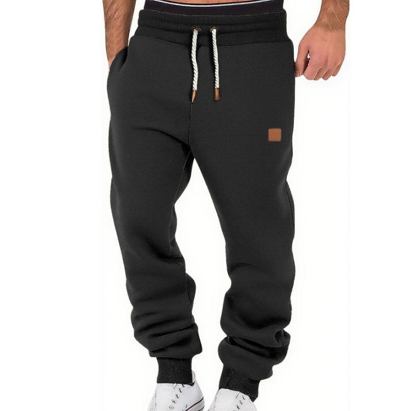 Pantalones de chándal deportivos casuales de moda para hombre de primavera otoño de color sólido, leggings holgados y pantalones de felpa