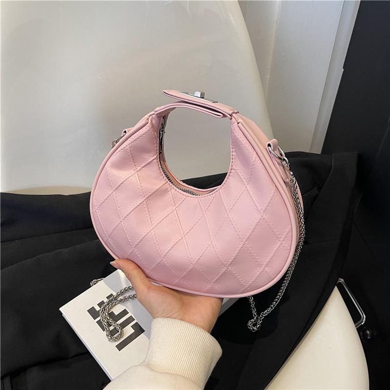 

Underarm casual bag women s 2024 new summer Korean version trendy foreign style design fashionable solid color shoulder portable dumpling bag рожевий