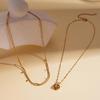 Diamond-Set Titanium Steel Heart Necklace with Unique Openwork Design - Elegant Choker for Women.