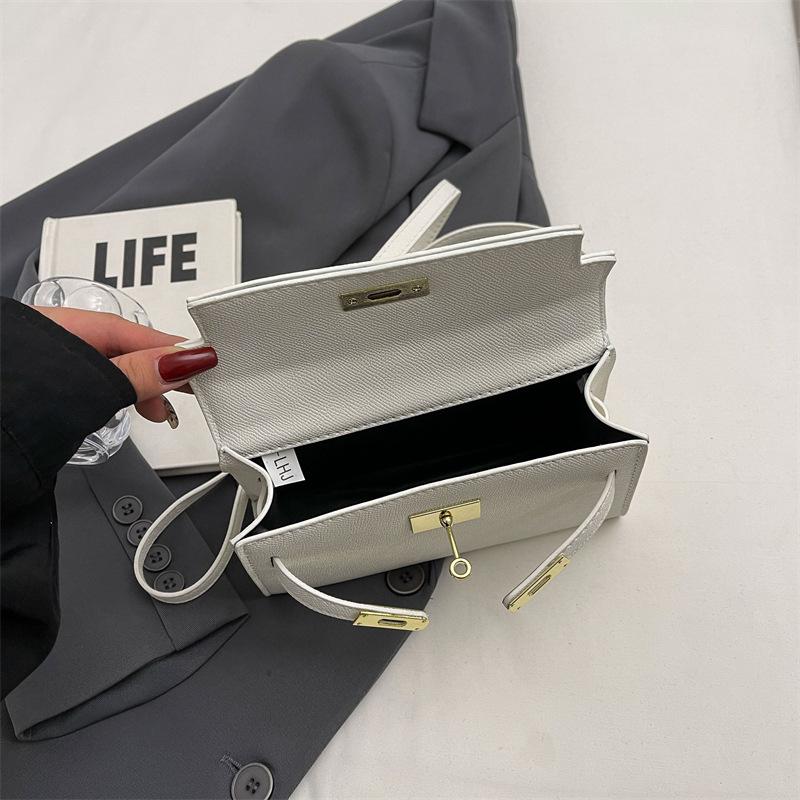 New fashionable solid color cross pattern portable shoulder oblique span trendy women's bag