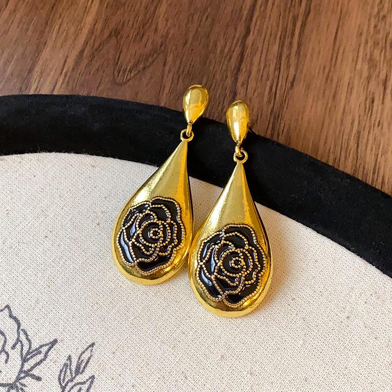 

Silver needle dripping oil rose water drop earrings court style retro temperament earrings niche fashion design earrings