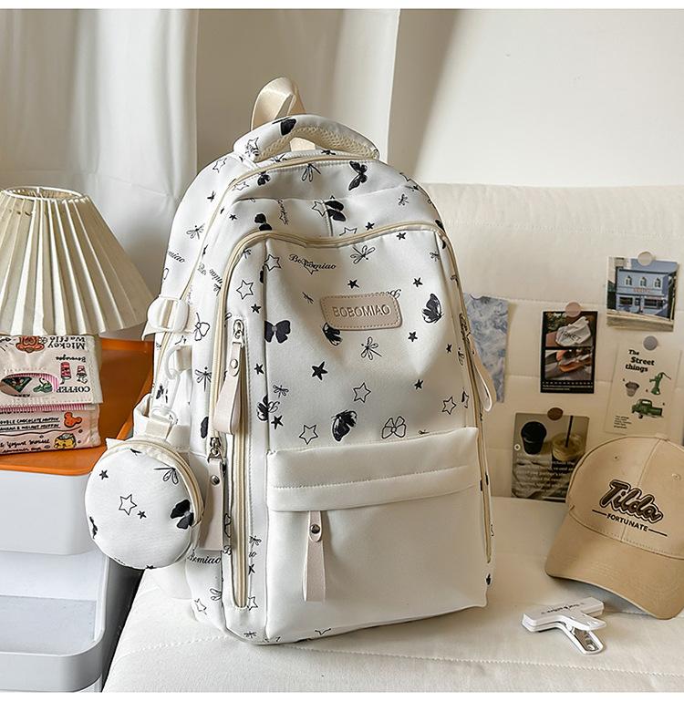 Cartable grande valeur petit frais doux fille sac à dos mignon dessin animé sac à dos grande capacité collège étudiant sac d'école