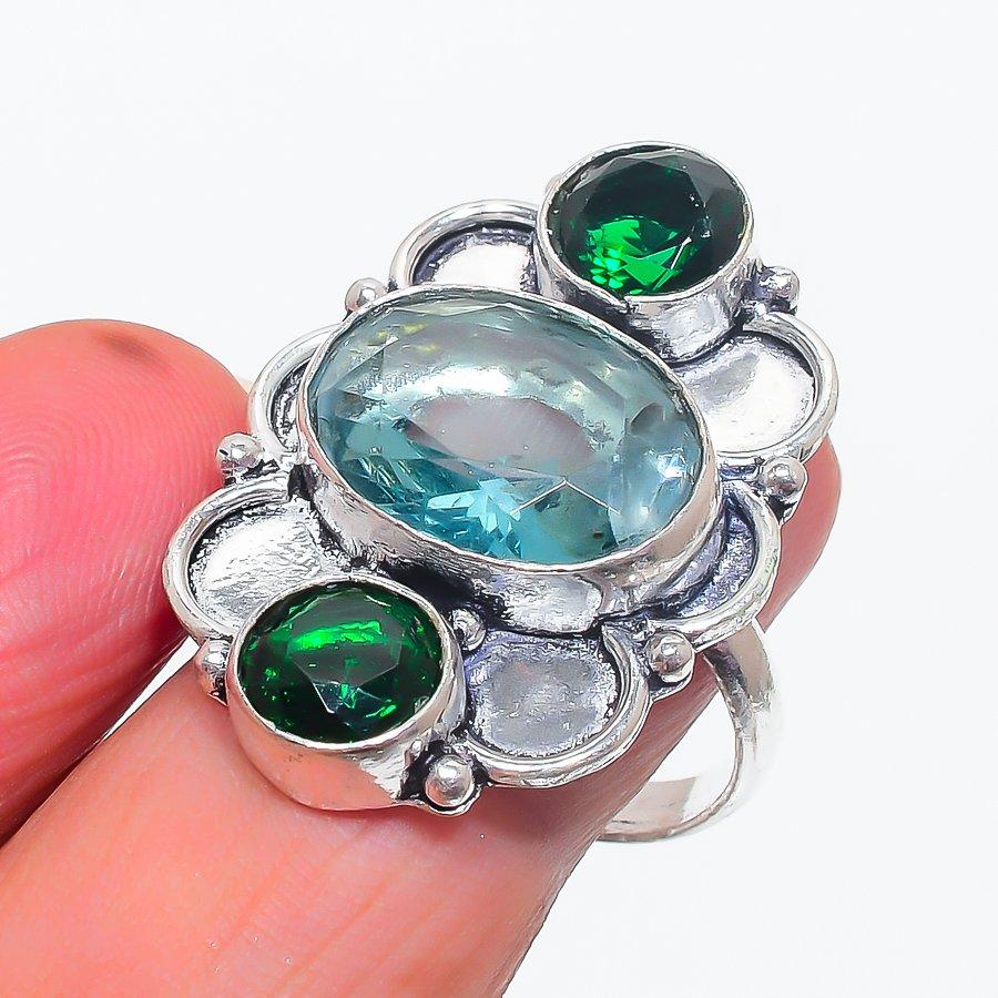 

Кольцо из серебра 925 пробы с натуральным швейцарским голубым топазом и диопсидом, размер 8,5 L5z12