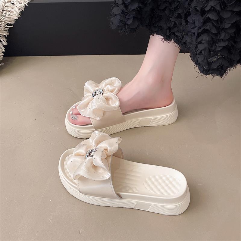 Cool slippers female summer outer wear one-word slippers thick-soled Korean version fashion explosion shopping sandals fairy wind outer wear beach