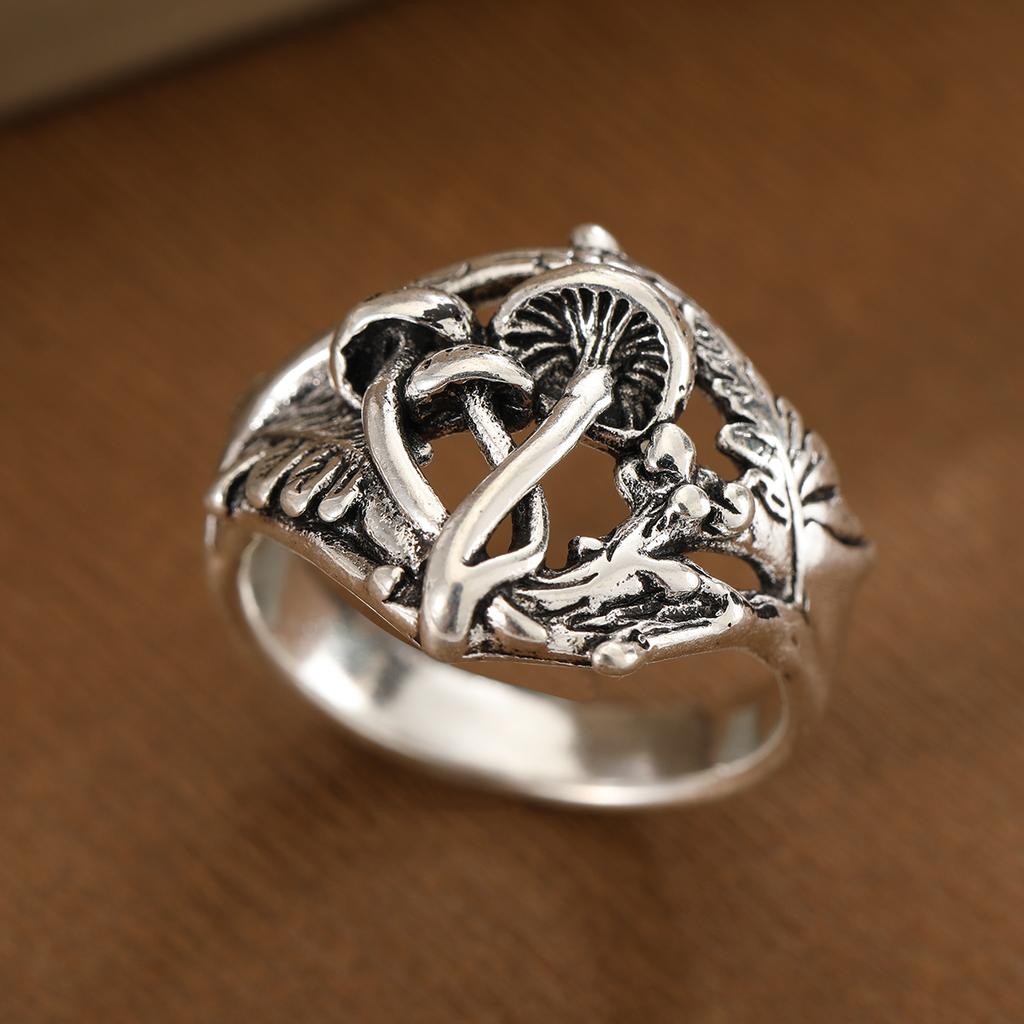 Retro-style hollow mushroom-shaped ring made of copper. Women's jewelry ring. Suitable for daily wear and for office outfits.