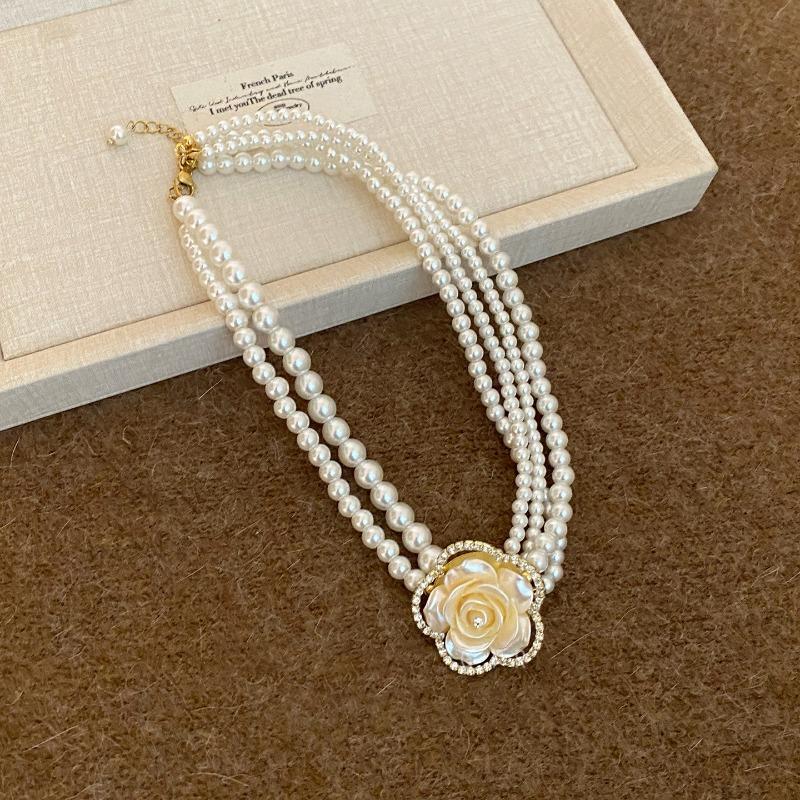 Diamond-encrusted flower multi-layer pearl necklace French retro temperament versatile collarbone chain light luxury high-end sweater chain women