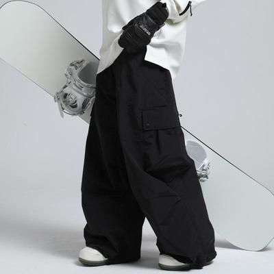 Calças de Snowboard Quentes Impermeáveis Unissex: Roupa de esqui de cintura solta para o inverno