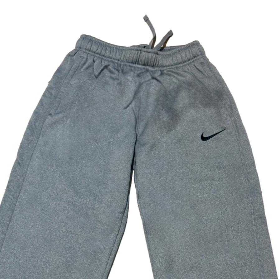 Nike Pohodlné jednobarevné fleecové kalhoty se stahovací šňůrkou Dětské spodní díly 452695-063