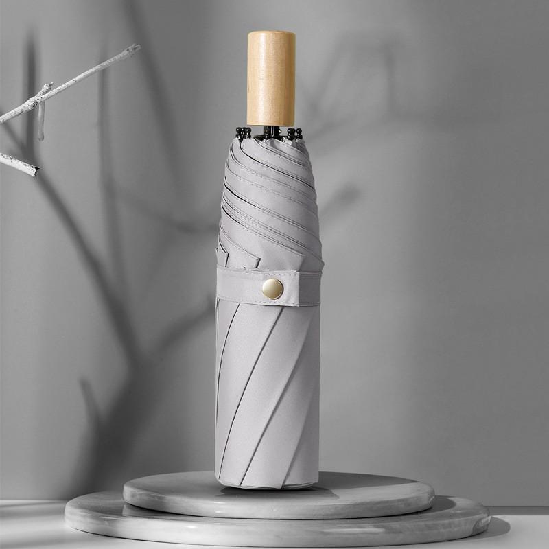 

Тройная деревянная ручка Черная резинка и зонтик Защита от солнца Защита от ультрафиолета Ms. Маленький свежий складной зонт