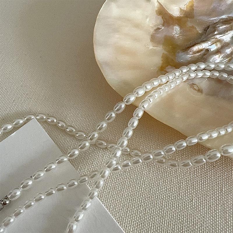 Retro pearl beaded magnetic necklace niche light luxury court style collarbone chain fashionable versatile temperament necklace
