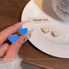 Blue resin wearing love ear buckles on both sides, women's new trendy temperament, niche high-end earrings, ear jewelry