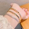 Bracciale a nido d'ape con pietre di zirconio micro-incastonate, Superficie liscia alla moda, Accessorio di lusso e di alta gamma