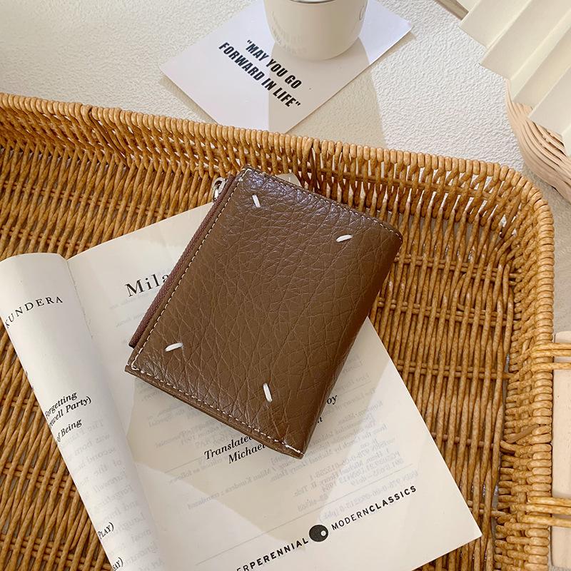 Korean version of women's wallet ins women's small wallet women's high-end short wallet change bag solid color zipper hand-held