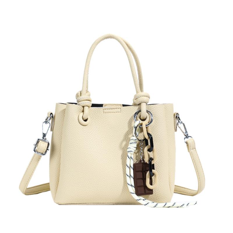 Wholesale Hot Sale Niche Simple Style Solid Color Portable Bucket Bag Commuting Versatile High-end Feeling Foreign Messenger Bag Woman