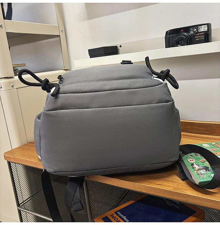 Lulu Japanese Casual Backpack Set: Large Capacity Schoolbag for College, Junior High Students, and Men & Women's Portable Use.