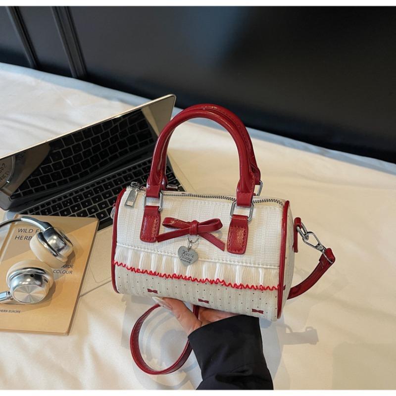 

Простая сумка с бантом, с ноткой изысканности, и цилиндрическая сумка кроссбоди белый/красный