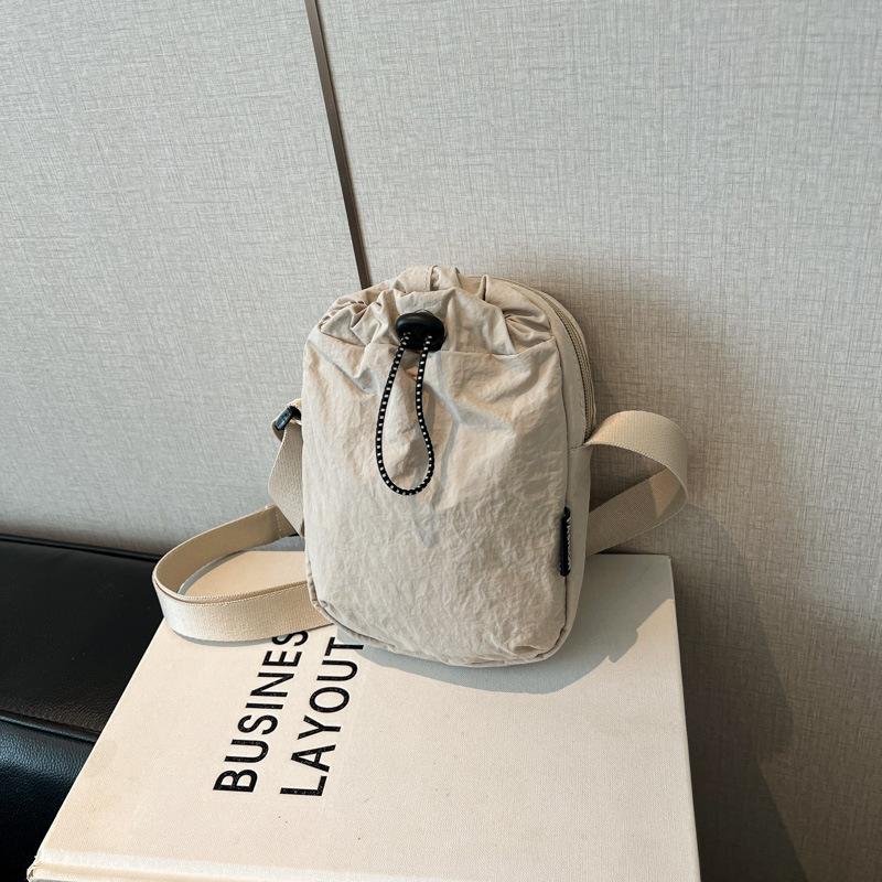 New Autumn Drawstring Mobile Phone Bag Simple and Fashionable Commuter Outdoor Leisure Crossbody Women s Bag