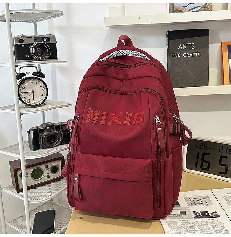Schoolbag trendy school bag male high school student female graffiti junior high school student backpack college student large capacity lightweight