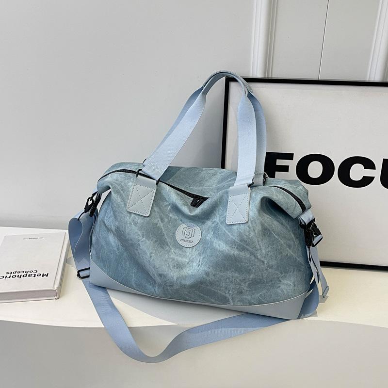 Large-capacity hand-held travel bag Women's fashion and light going out luggage bag Men's business trip travel storage boarding bag
