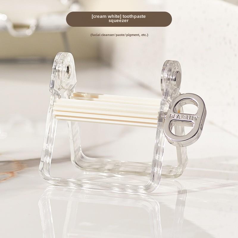 

Элегантный ручной роторный выдавливатель для зубной пасты, средств по уходу за кожей, краски для волос и краски белый