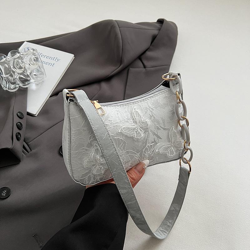

Butterfly beautiful portable shoulder bag women s spring and summer new niche simple casual versatile underarm bag срібний