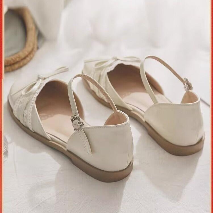 Mode mångsidiga rosettsandaler vår och sommar 2025 nya bekväma mångsidiga sandaler blomkant platta sandaler