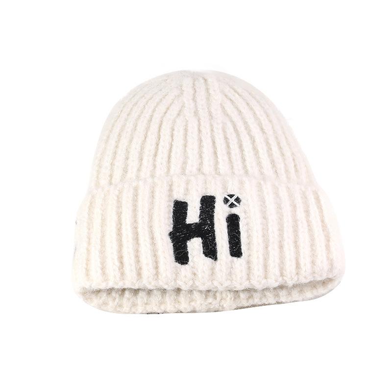 

Autumn and winter new wool hat women s warm ear protector pullover hat thickened cold hat versatile knitted hat tide 52-56cm молочный белый