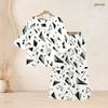 Women Plus Size Two Piece Set Round Neck Flared Half Sleeve Abstract Printed Black White Top And Long Pants