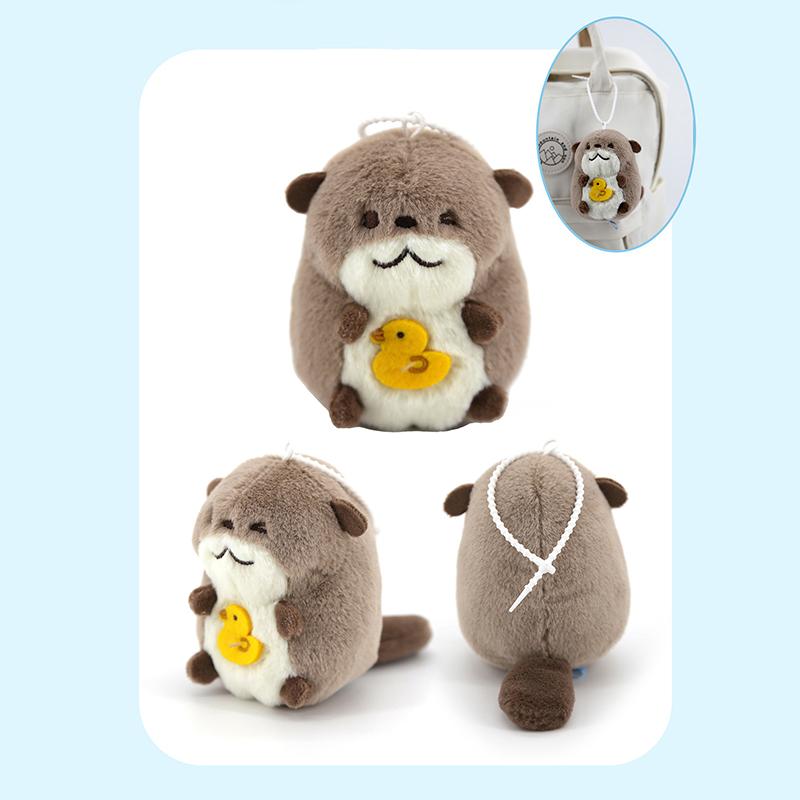 

1Pcs Cute Soft Animal Otter Hold Fish Plush Toy Keychain Pendant For Children Backpack Accessories Pendant Baby Toys Small Gift