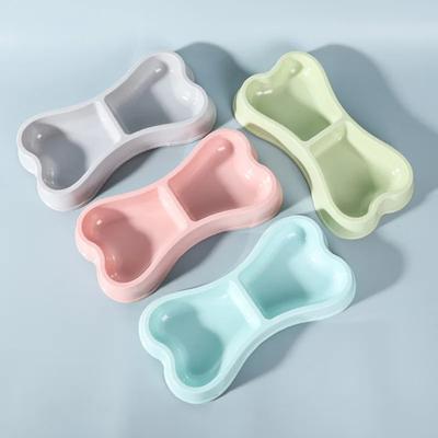 Ciotola doppia per gatti in plastica a forma di osso colorato macaron