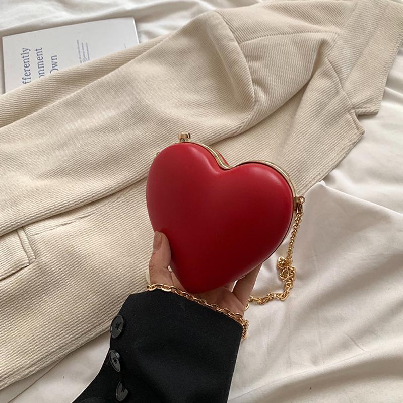 

Повсякденна проста модна сумка-помада, жіноча нова літня модна сумка 2024 року, повсякденна сумка-мессенджер на ланцюжку у формі серця червоний