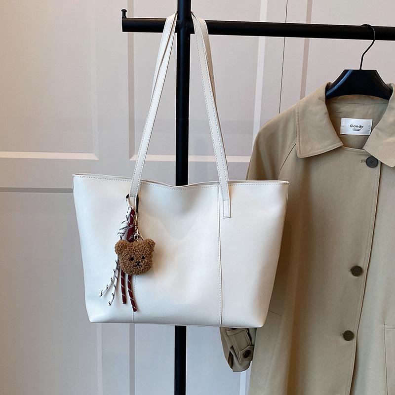 

Premium texture retro large capacity tote bag new commuter shoulder bag student class armpit bag no pendant білий