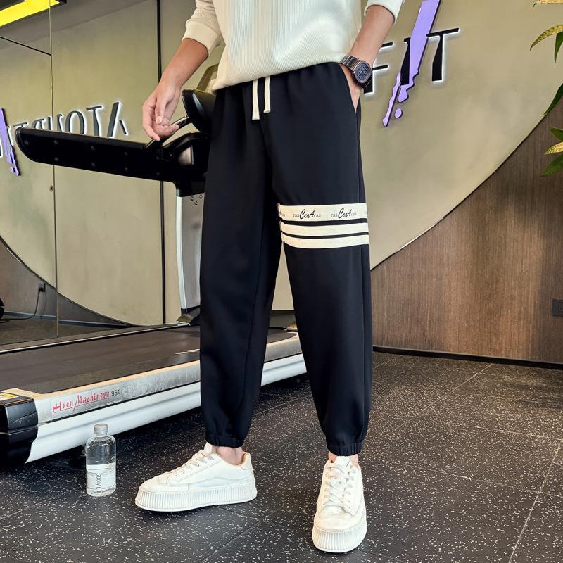 

Мужские зауженные гаремные спортивные штаны длиной девять точек - Весенне-осенний повседневный стиль 2024 Medium (90-115 jin recommended) чёрный