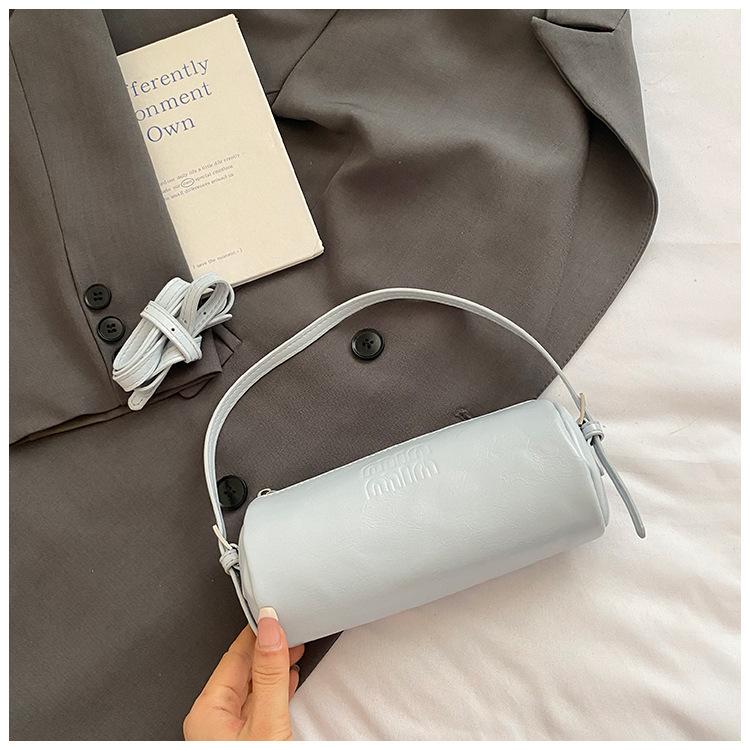 

2025 нишевый дизайн модная универсальная сумка-цилиндр для поездок премиальная текстура сумочка на одно плечо через плечо женская сумка синий