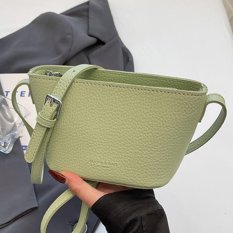 

Оптовая продажа женской сумки-ведра в простом стиле с узором «старший личи», нишевой, для通勤, повседневной, универсальной, в иностранном стиле, сумки-мессенджера