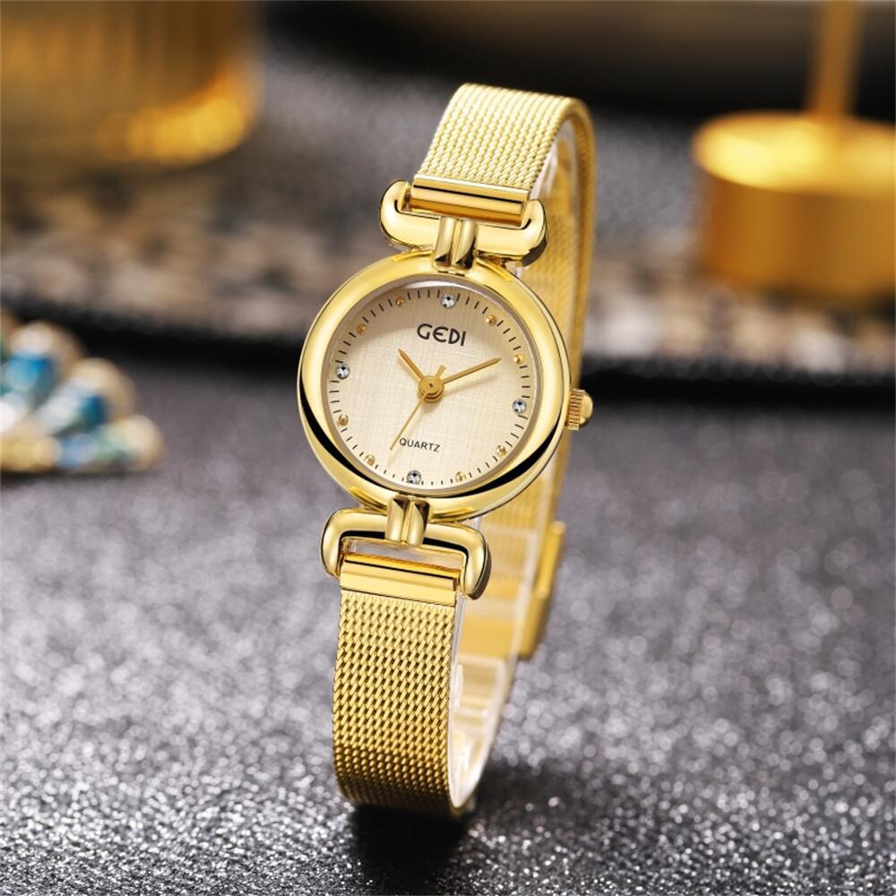 Nischen High-End Damenuhr Stoffmuster Kleines rundes Zifferblatt Mesh-Armbanduhr Wasserdichte Quarz Damenuhr Mittelalterliche Uhr