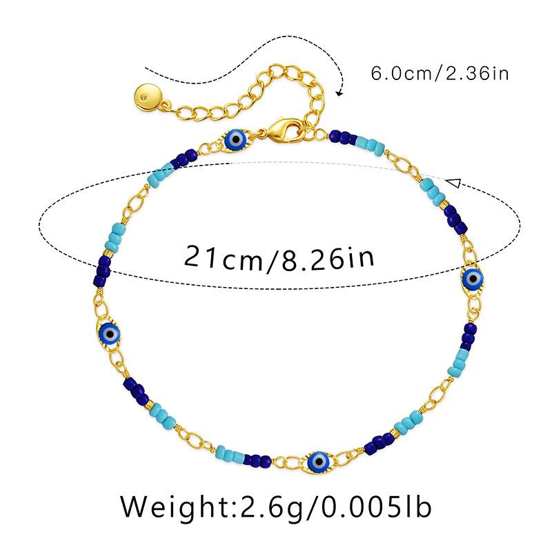 Brățară de gleznă cu talisman Ochiul Rău din mărgele albastre placată cu aur