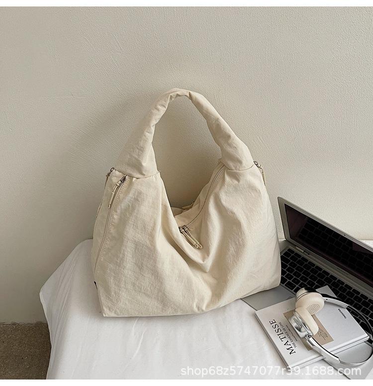 2025 New Large Capacity Versatile Portable Canvas Bag Premium Sense Tote Bag Fashion Commuter Underarm Shoulder Bag Women