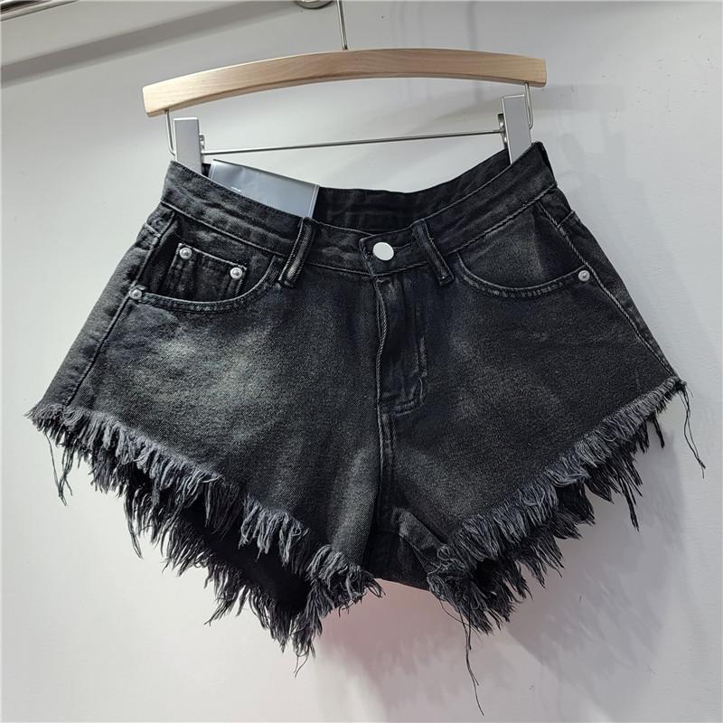 Korean version 2023 summer new fringed rough edge high waist denim shorts women's loose and thin a-shaped wide leg pants hot pants