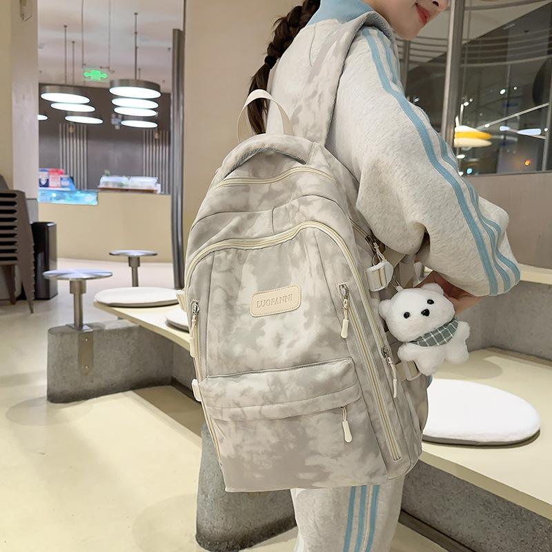 School bag Female and male primary school students Large capacity backpack Junior high school students High school students Lightweight