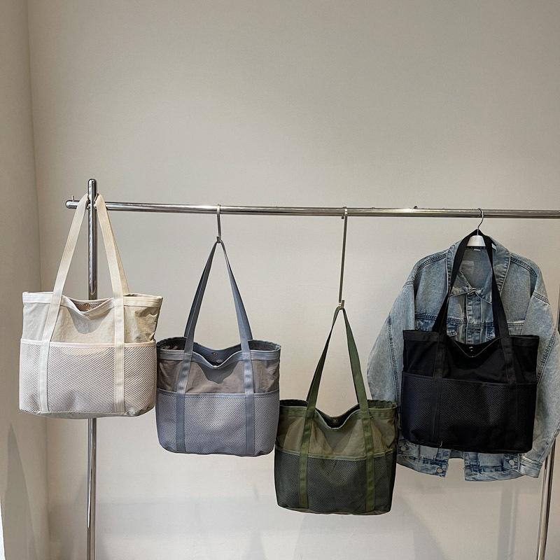 Large capacity niche 2025 summer new casual trend fashion handbag personalized portable tote bag