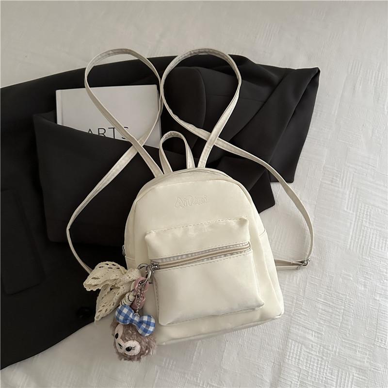 Retro Style Ladies Backpack With Special Fabric And Seam Detailing For Travel And School
