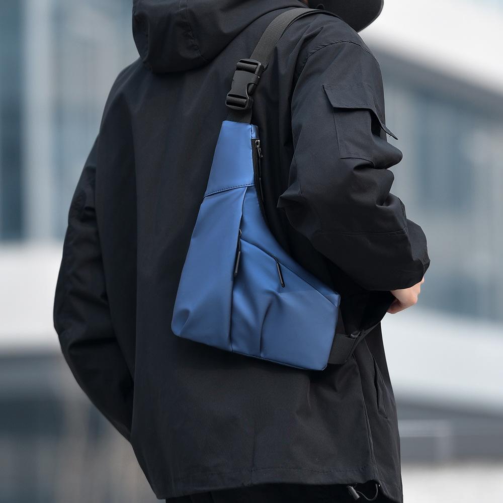 New men's portable breast bag outdoor sports shoulder bag simple irregular light oblique span bag casual fanny pack tide