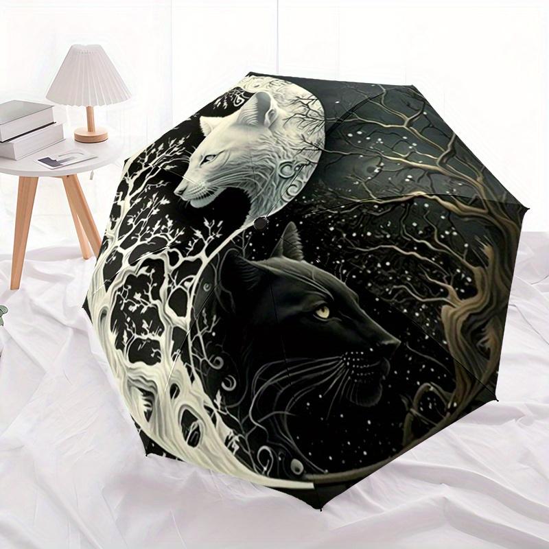 Yin Yang Cats with Intricate Tree Patterns - A folding umbrella with 8 iron ribs, plastic handle, and automatic opening/closin
